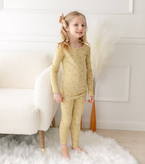 AVAUMA Bling Long Sleeve Set Mustard Yellow Ruffle Shirring These pajamas have a stylish 'Ruffle Shirring' design and are soft, stretchy, and comfortable.