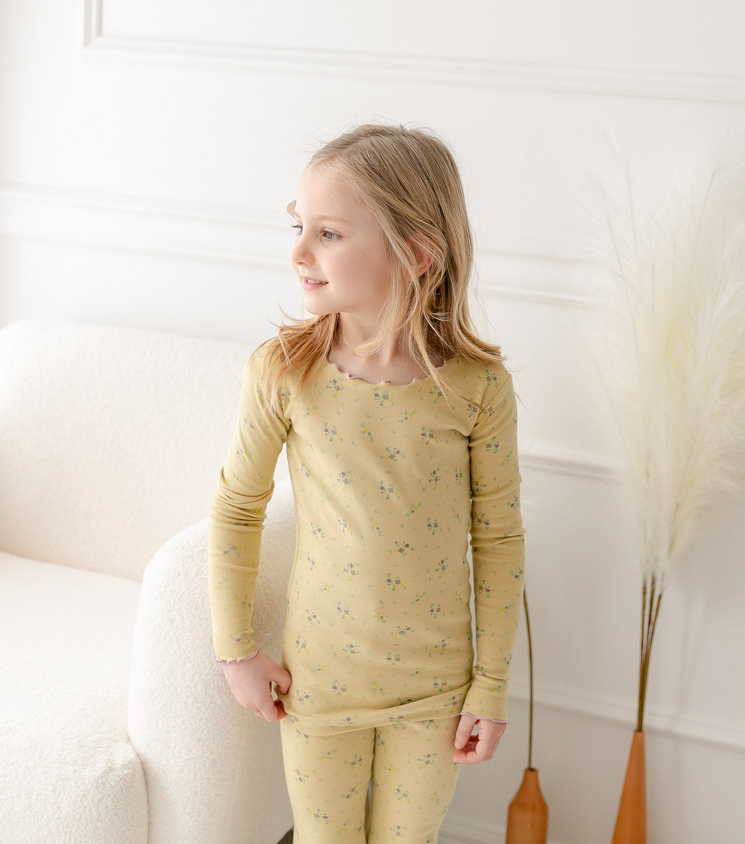 AVAUMA Bling Long Sleeve Set Mustard Yellow Ruffle Shirring These pajamas have a stylish 'Ruffle Shirring' design and are soft, stretchy, and comfortable.