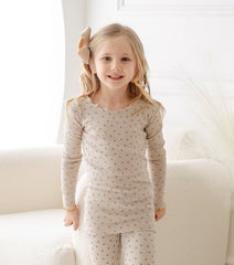 AVAUMA Liang Long Sleeve Set Beige Ruffle Shirring These pajamas have a stylish 'Ruffle Shirring' design and are soft, stretchy, and comfortable.