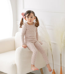 AVAUMA Roses Long Sleeve Set Pink Ruffle Shirring  These pajamas have a stylish 'Ruffle Shirring' design and are soft, stretchy, and comfortable.