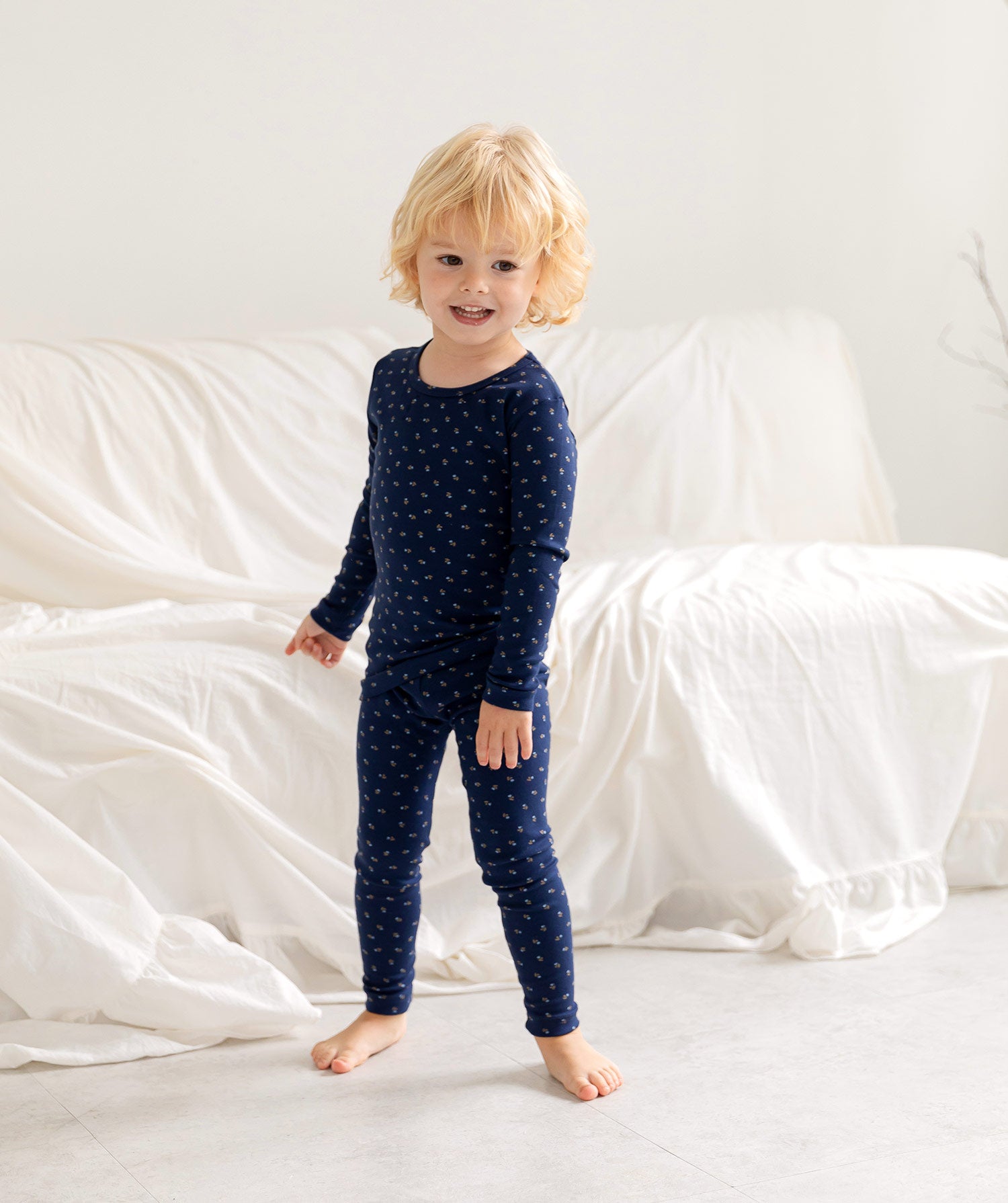 AVAUMA Rose Long Pajama Navy Flower Pattern Perfect for all-day comfort, they're great for a relaxing day at home or any leisure activity. A reliable choice for parents seeking long-lasting sleepwear.