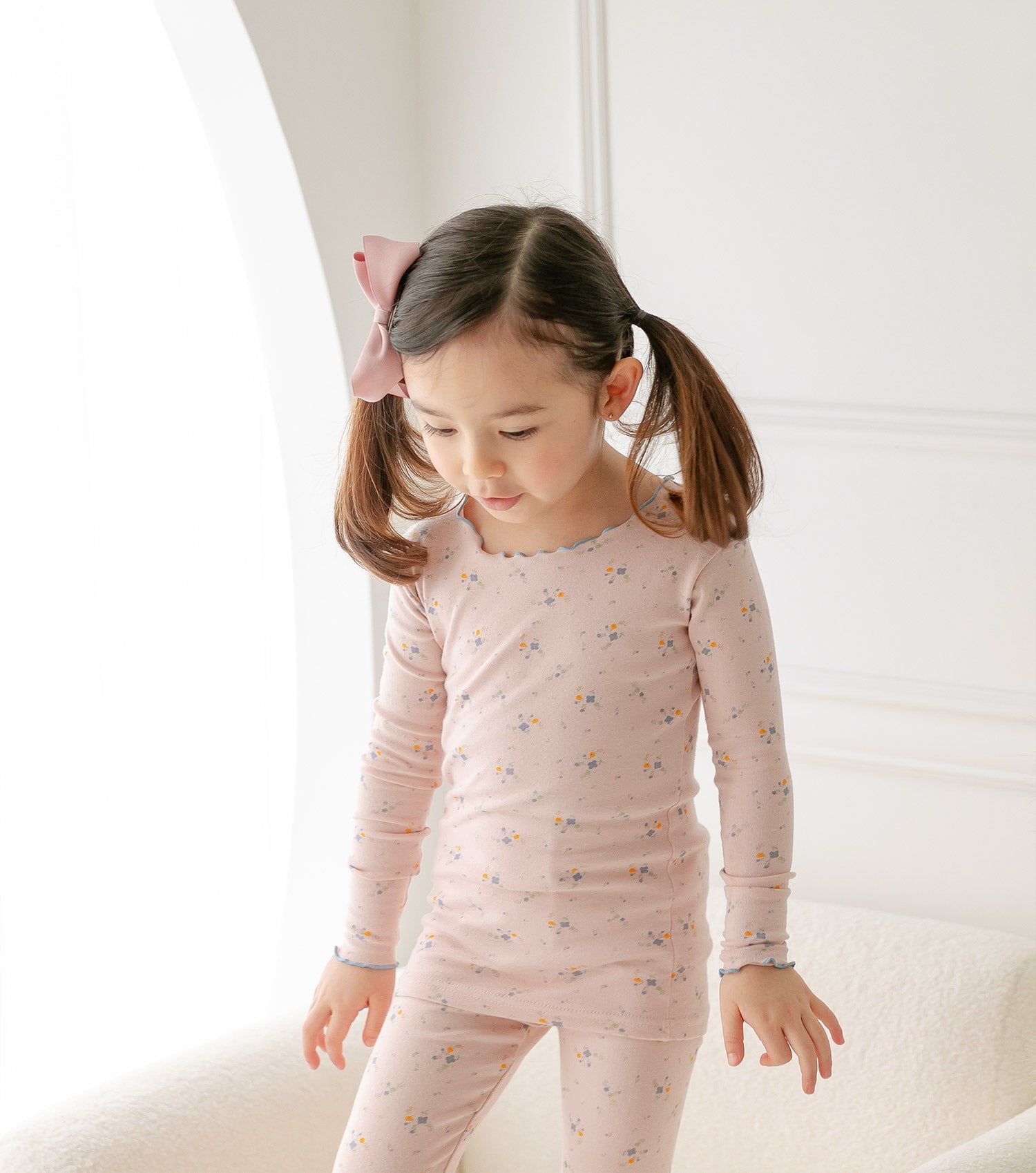 AVAUMA Bling Long Sleeve Set Pink Ruffle Shirring These pajamas have a stylish 'Ruffle Shirring' design and are soft, stretchy, and comfortable.