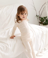 AVAUMA Momo Long Pajama Ivory Flower Pattern Perfect for all-day comfort, they're great for a relaxing day at home or any leisure activity. A reliable choice for parents seeking long-lasting sleepwear.