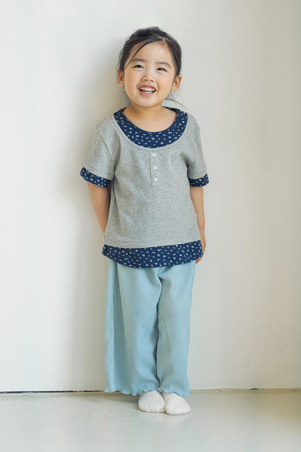 Toddler girl wearing Avauma Sky Blue wide-leg pleats pants