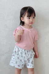 Toddler Girl Wearing Avauma Fluffy Garden Cream Rose Baby Shorts, Matched with Pink T-Shirt

