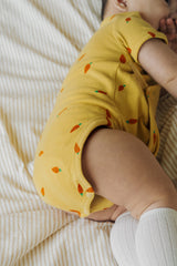 Avauma baby bodysuit detail short sleeve wrap style yellow carrot print snap closure cotton fabric