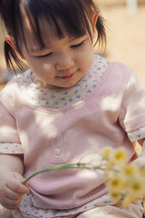 Floral neckline detail on Avauma Pink Ivory baby summer tee