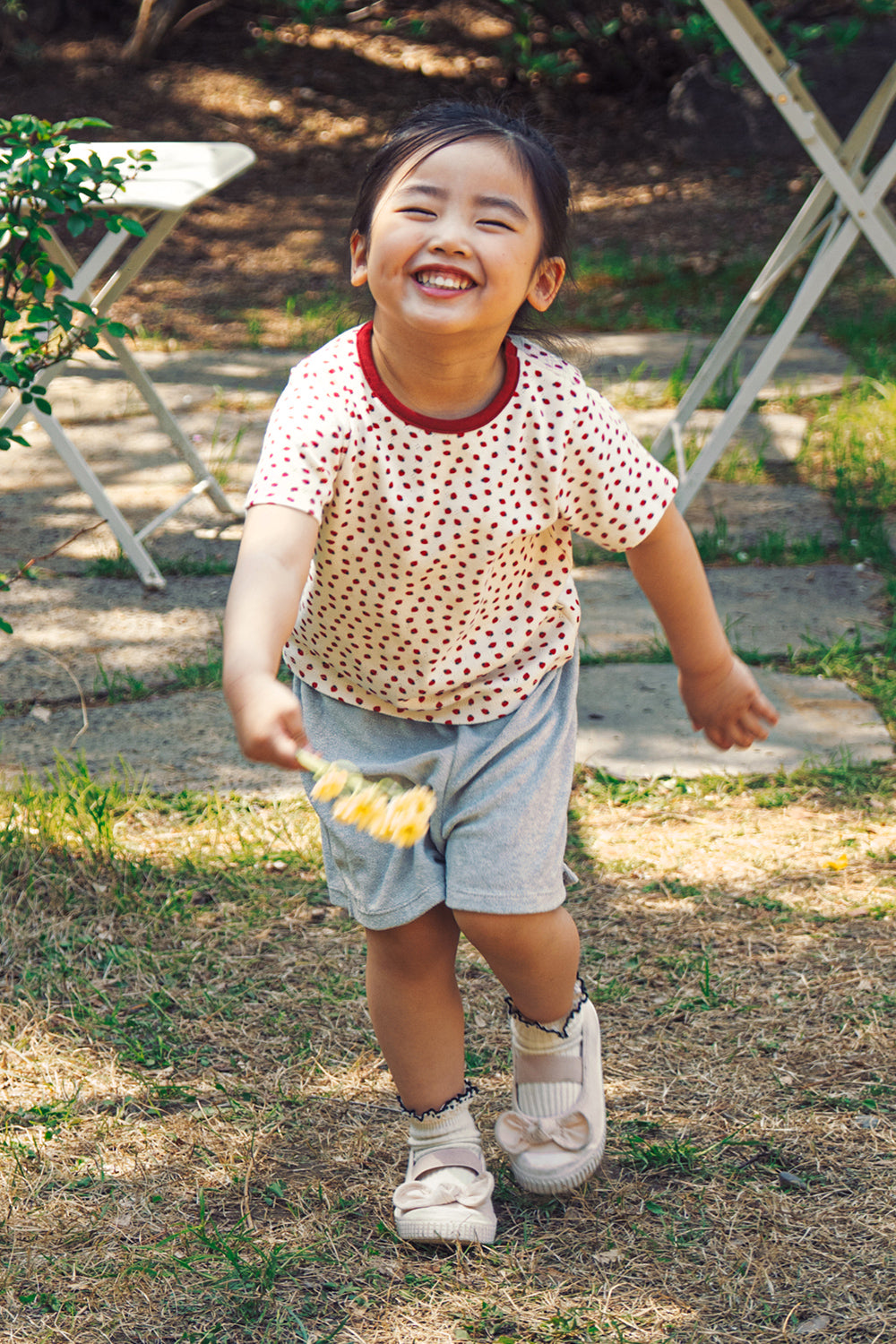 Active toddler girl running in AVAUMA lightweight cotton summer setup