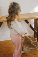 avauma toddler daily wear outfit in soft pink jogger pants, indoor lifestyle
