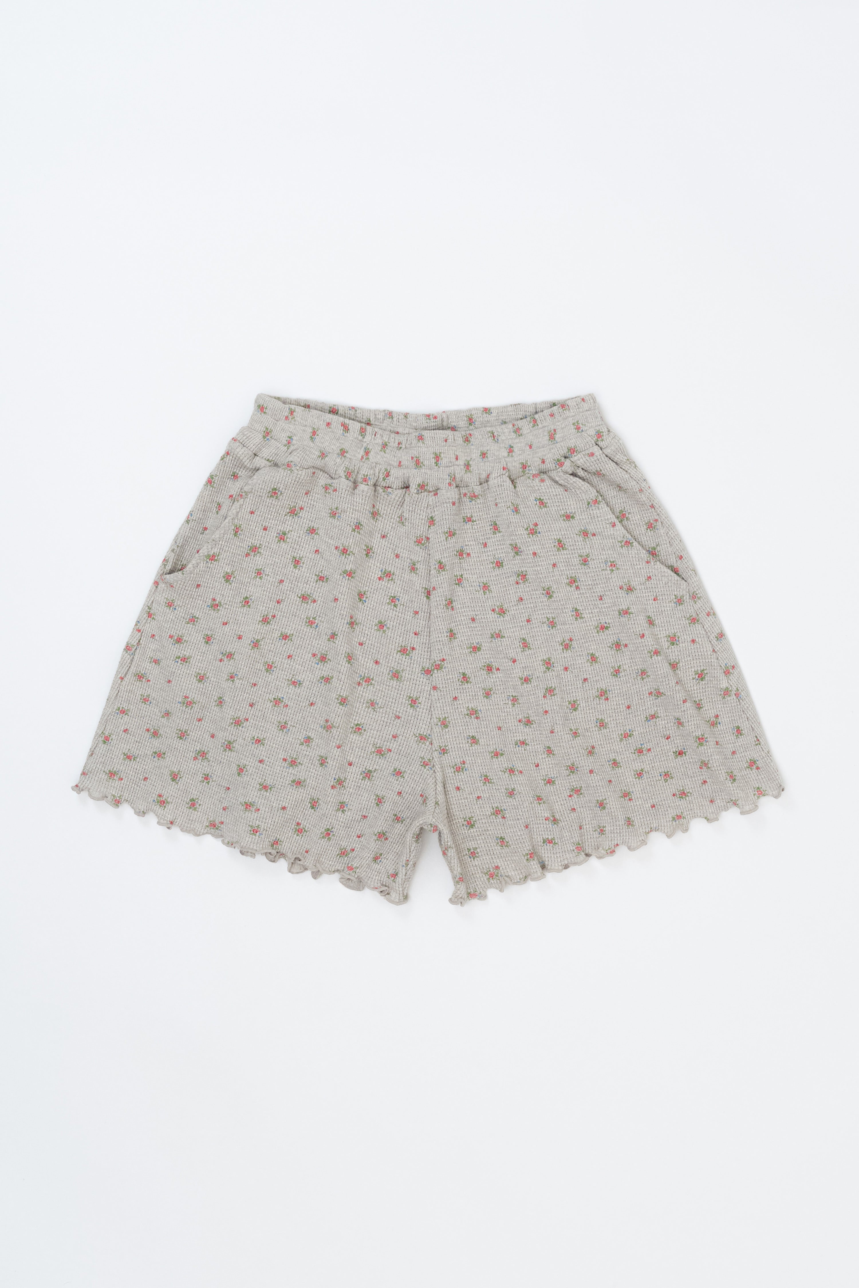 Avauma Petitbloom mom shorts in rosy cream floral print laid flat on white background.

