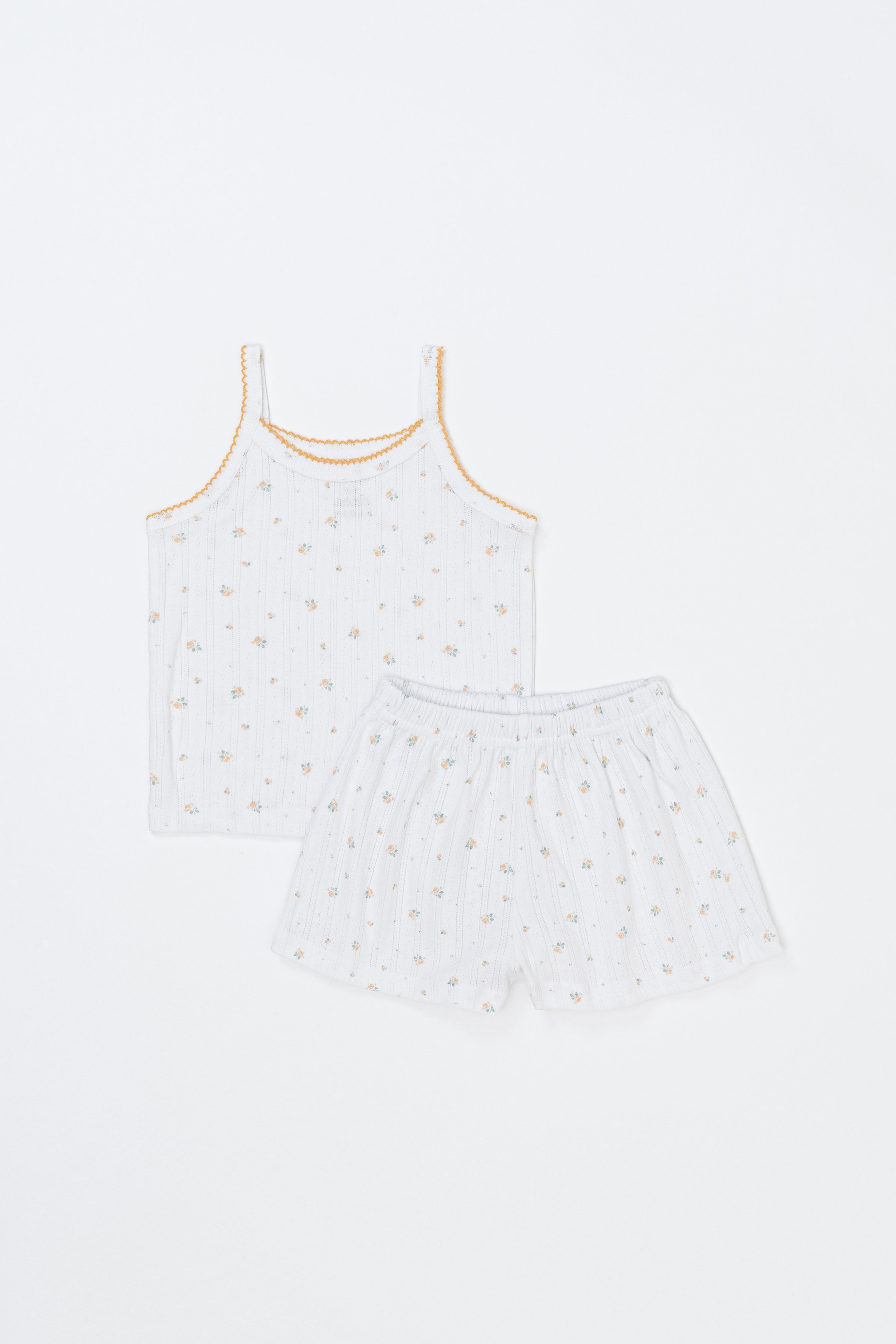 Avauma picnic tank top and shorts set in Butter Daisy pattern displayed flatly
