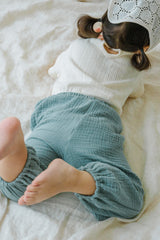 Toddler Lying Down in Avauma Breeze Jogger Pants Sage Mint, Lightweight Elastic Waist Cotton Jogger Pants


