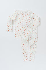 Avauma Mini Fleur Long Sleeve Set - Floral Africot, a delightful white pajama set with small orange floral designs, offering comfort and style for your baby.
