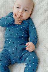 Baby wearing Avauma Mini Fleur Long Sleeve Set - Floral Navy, showcasing the soft fabric and detailed floral print, ideal for baby sleepwear.