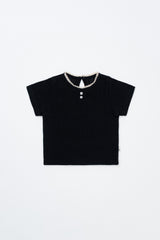 Flat Lay of Avauma Le Petite Classic Black Short Sleeve Top, Soft Cotton Puff Sleeve T-Shirt for Toddlers


