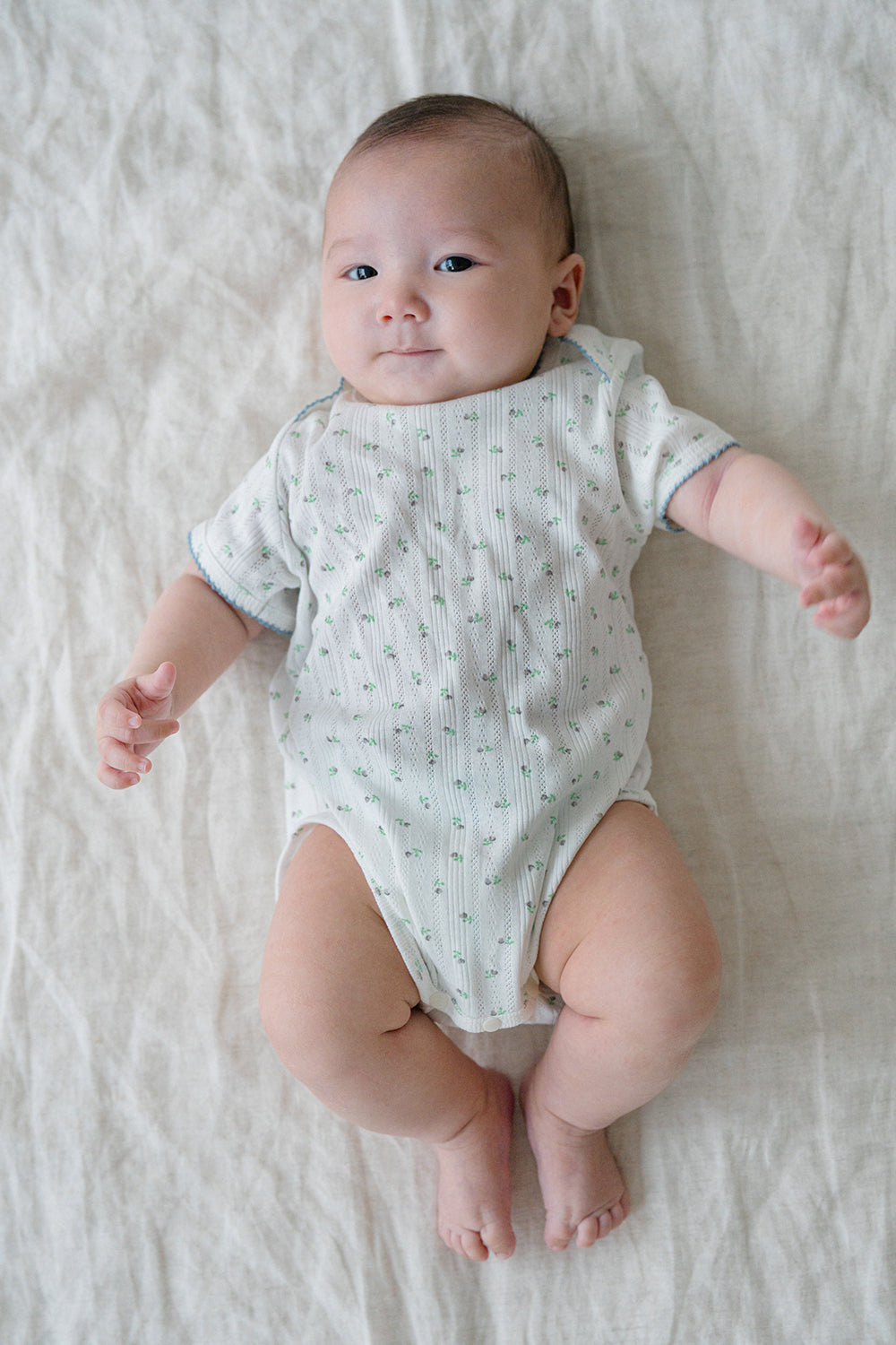 Baby Lying Down in Avauma Petite Garden Mintgarden Short Sleeve Bodysuit, Comfortable Summer Babywear

