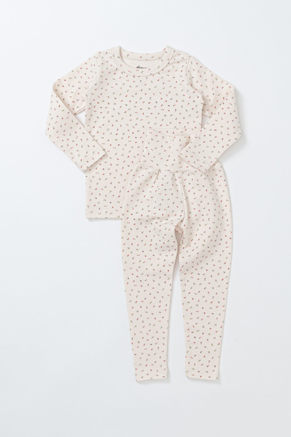 Avauma Floral Melody Long Sleeve Baby Pajamas in Vanilla Ivory, featuring delicate floral prints and a soft ivory fabric for a cozy fit.
